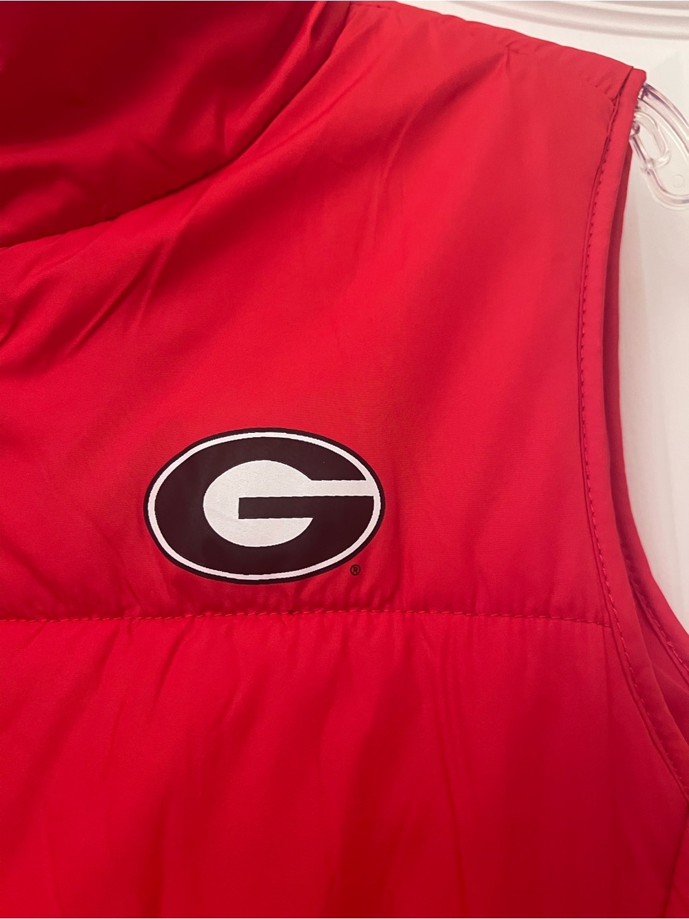 Red Puffer Vest with Black-Outlined G Team Logo